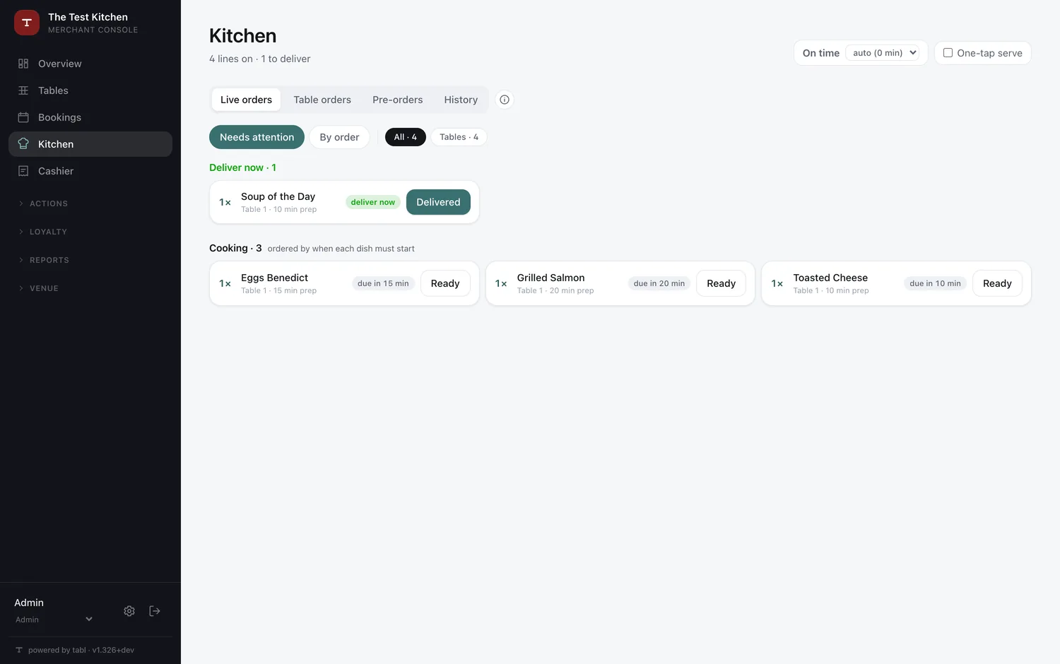 The kitchen board with just this table's dishes: one at the pass, the rest cooking, each with its due time