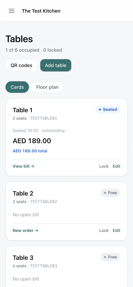 The tables list on the waiter's phone: this table seated with what it owes, the rest free